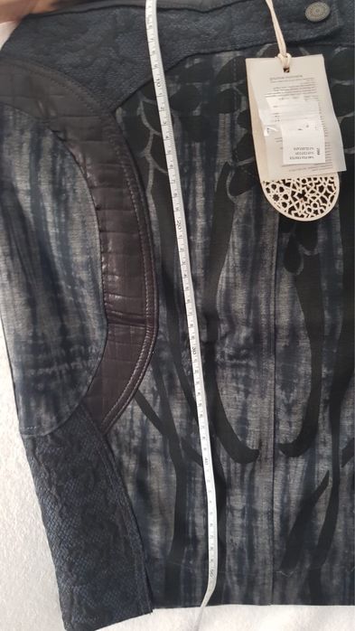 Нова пола с визия на комбинация на кожа, дантела