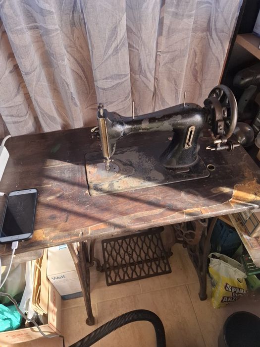 Masina de cusut Singer Ruseasca