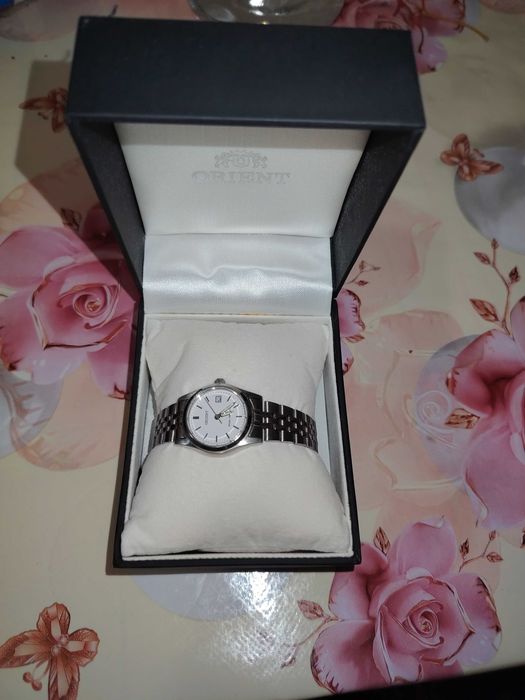 Женские часы Orient/Romanson