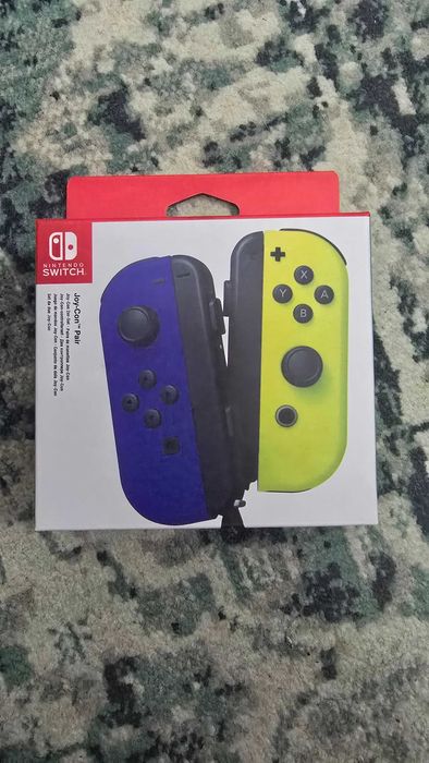 Set 2 joycons Nintendo Switch, noi, galben/albastru