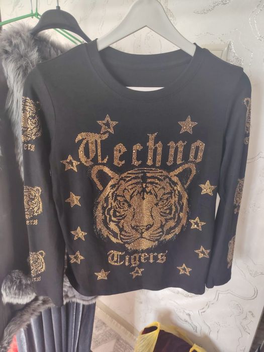 продам модные одежды