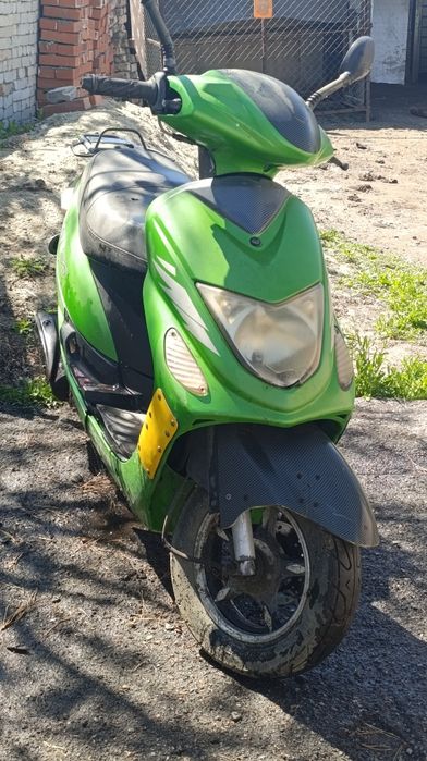 Скутер. Цвет зелёный. Торг