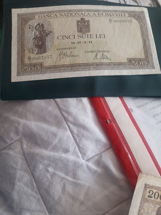 Vind 2 bacnote,1, 2000 lei si 1 cinci sute lei