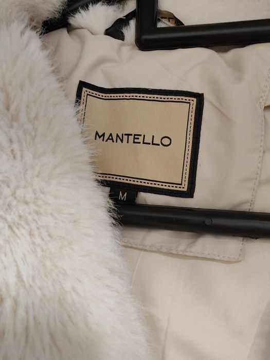 Пуховики женские