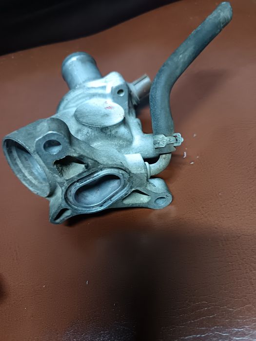 Корпус термостата на хонда