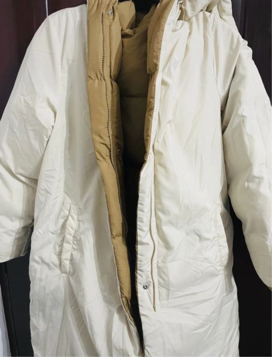 Geacă de puf cu două fețe.