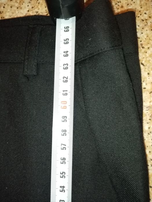 Чёрные брюки на мальчика 134