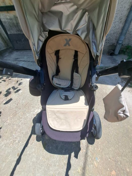 Бебешка количка X-lander с много подаръци към нея