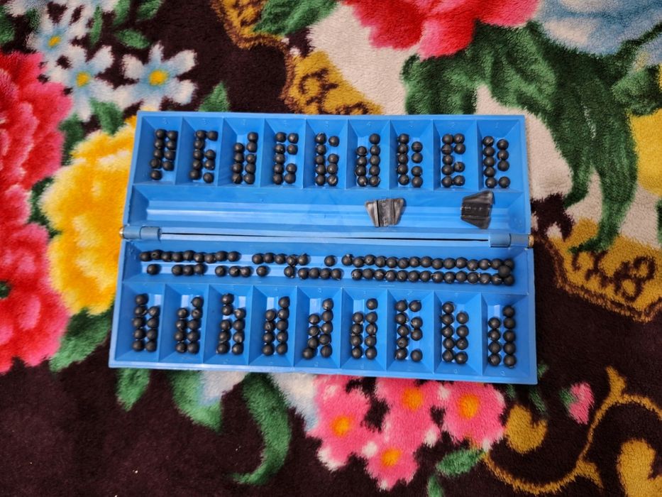 Тоғызқұмалақ настольная игра
