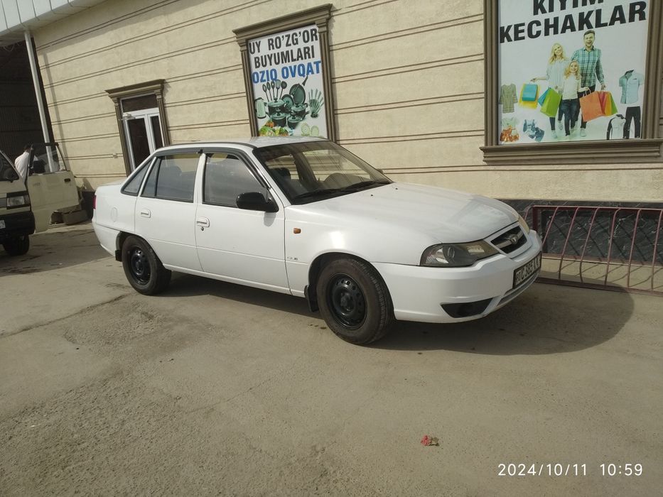 Нексия сотилади 16 2009 йил прабек 280000 полной полной