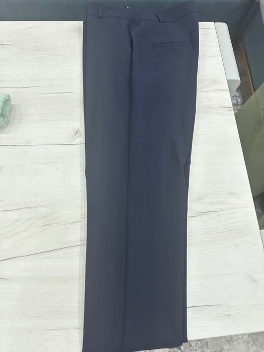 Женский костюм темно синего цвета