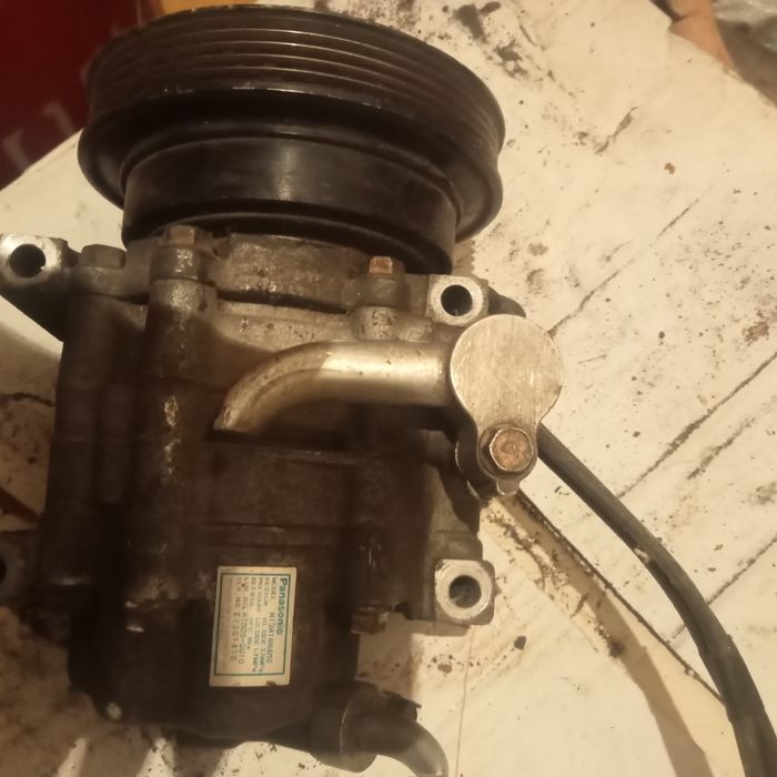 Компрессор кондера Мазда кронос     приемаси и    птичка.