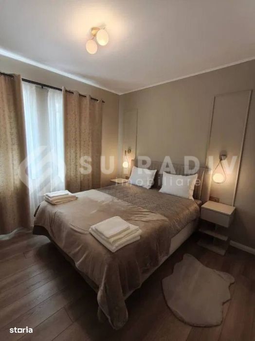 Apartament modern, curte proprie, parcare- zona Ira