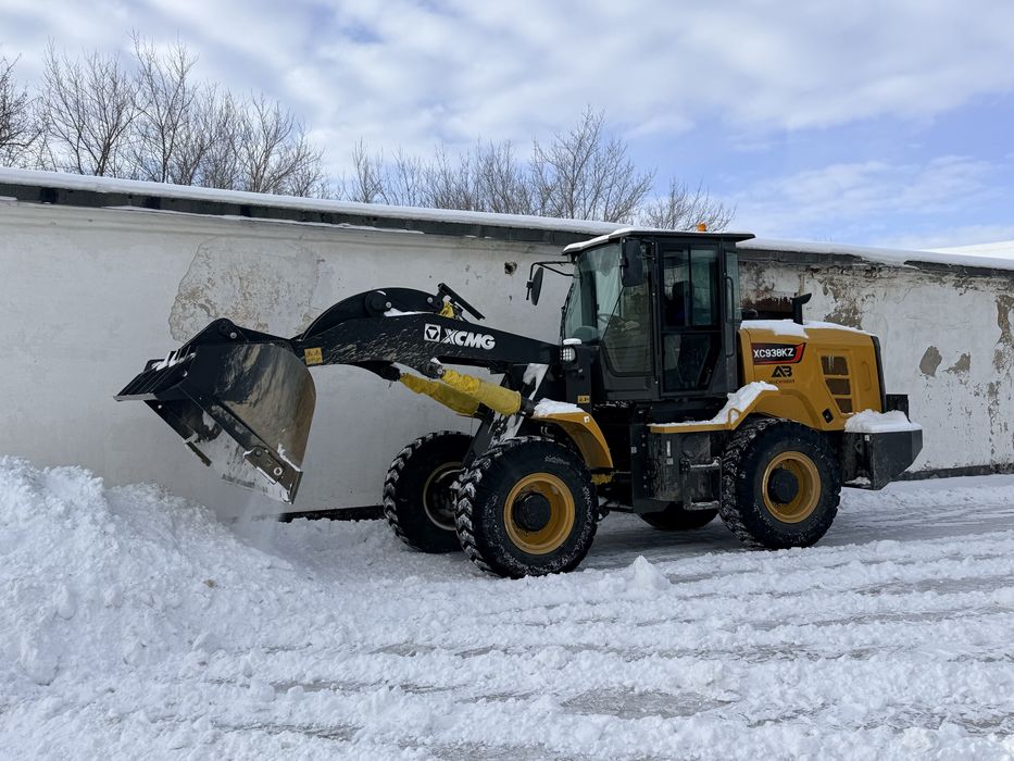 Услуга фронтального погрузчика.