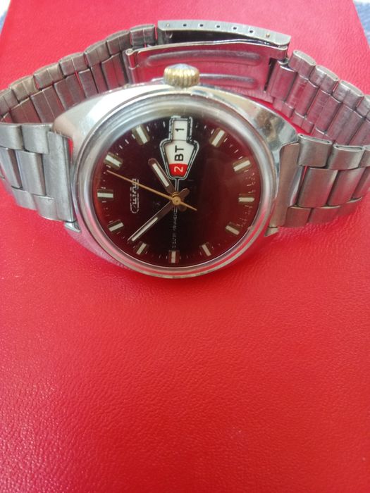 часы Слава 26 камней ( СССР ) двойной календарь