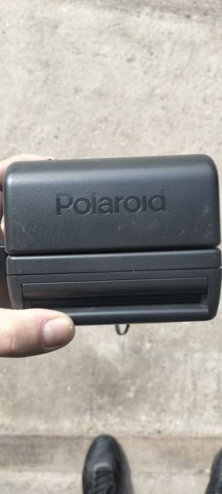 Полороид фотоаппарат.