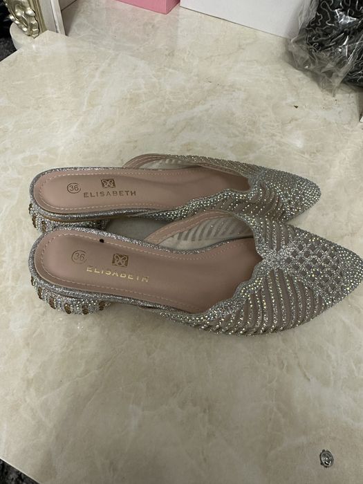 Тапочки новые тошли