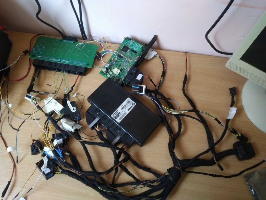 Reparatii Resoftari FRM Bmw Modul lumini X1 X5 X6 E90 E91 E84 E87 E70