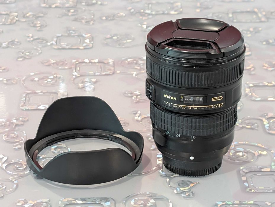 Obiective Nikon 18-35mm Nikon 50mm flash Nissin tuburi macro incarcator 12V Nikon acumulator Nikon original Nikon EN-EL15 curea de gat geanta dslr