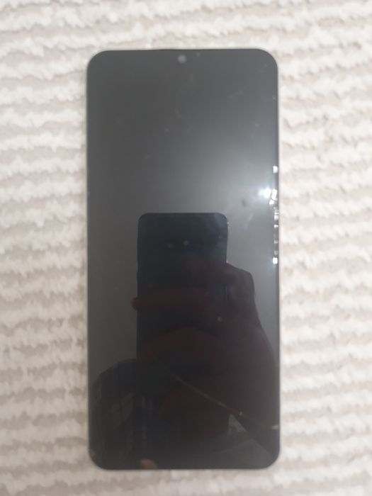 Телефон самсунг.