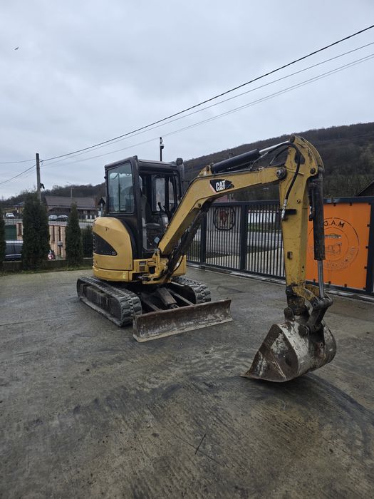 Vand miniexcavator Caterpillar 303 3200 kg