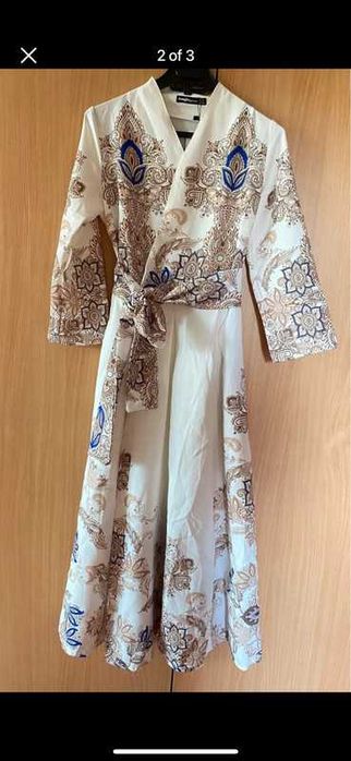 Rochie eleganta peste genunchi