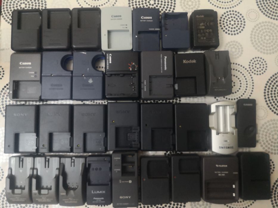 Canon. Sony. Casio. Nikon. Sanio. Olimpus. Kodak. Зарядки  для батарей