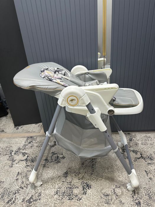 Детский стульчик для кормления фирма Текнум