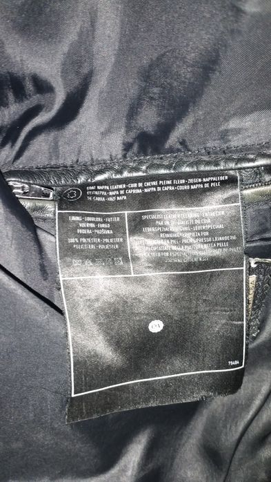 Черная кожаная куртка