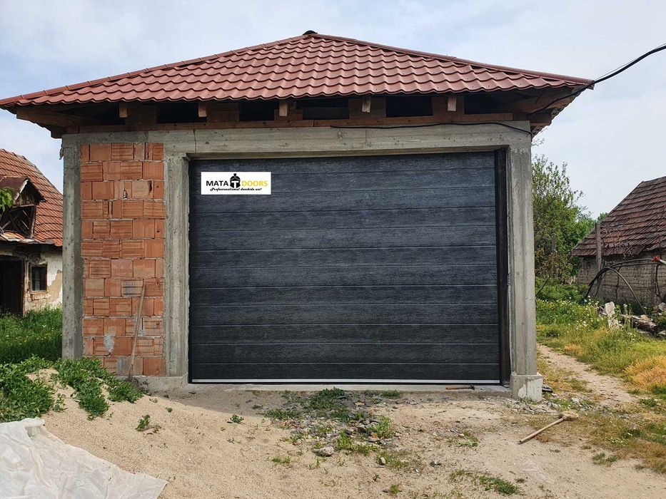 Distribuim la cel mai bun pret usi de garaj-TRANSPORT GRATUIT