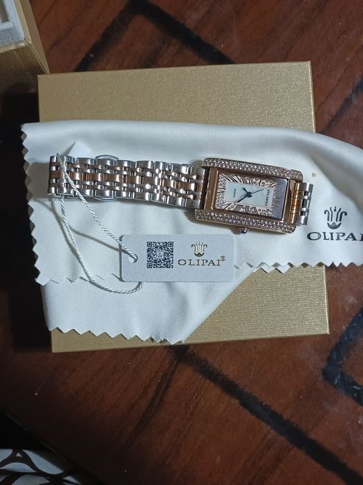 Часы бренда Olipai