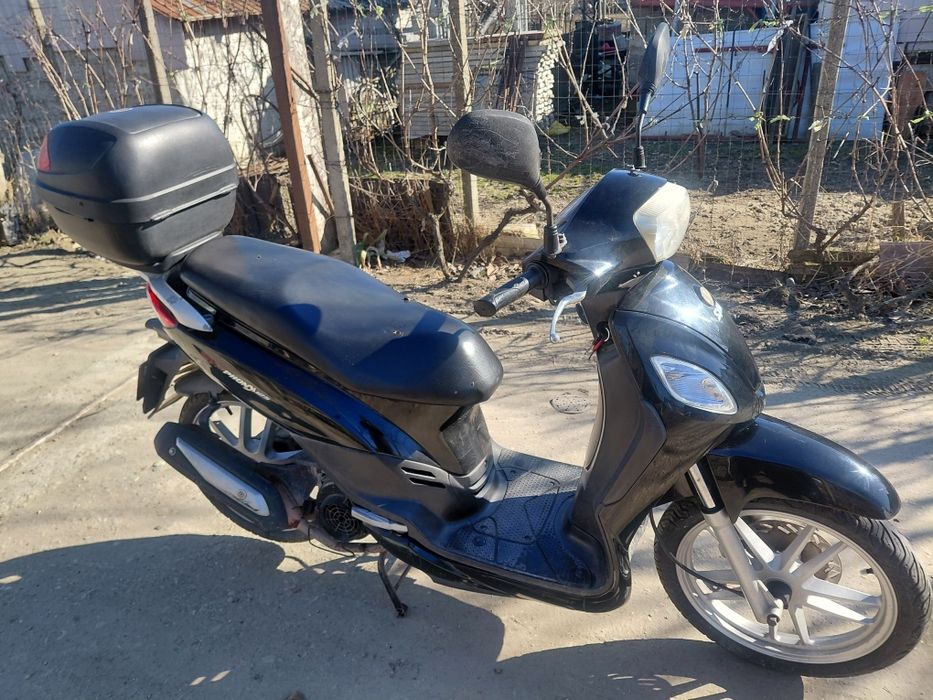 Vînd scuter Sim Symphony  125 s