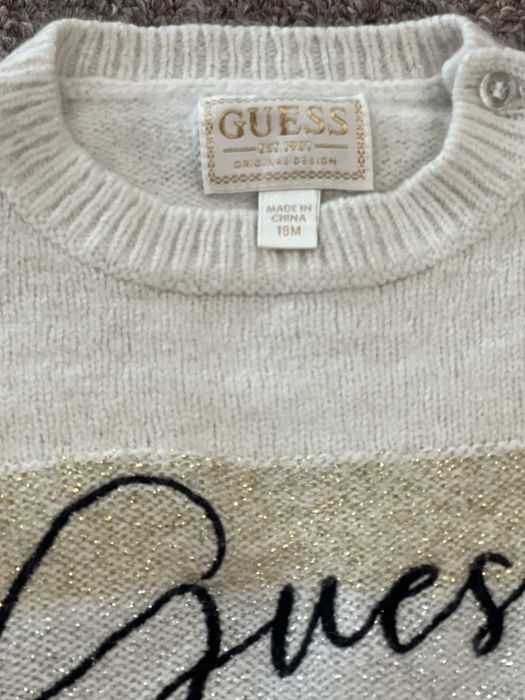 Екип Guess      .