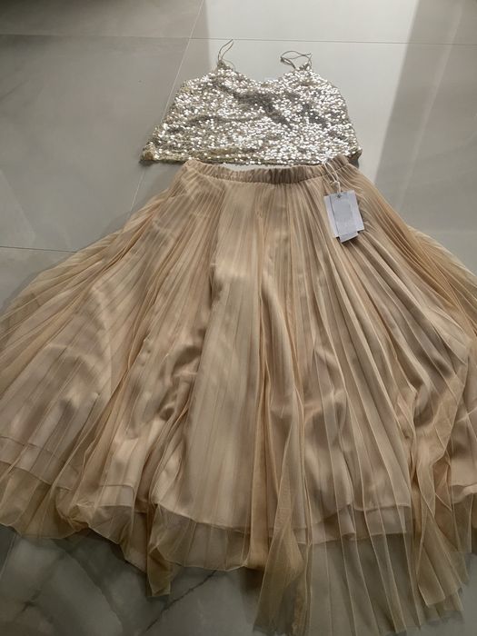 Fusta si maieu Imperial de culoarea roz pal marimea s ,noi cu eticheta