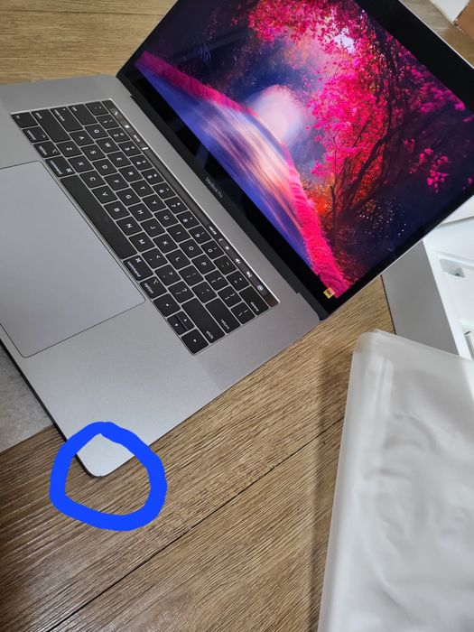 Macbook pro karobka hujati bilan