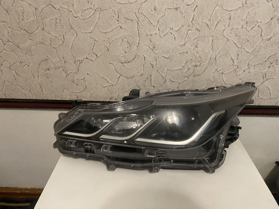 Фара на каролу 210 кузов