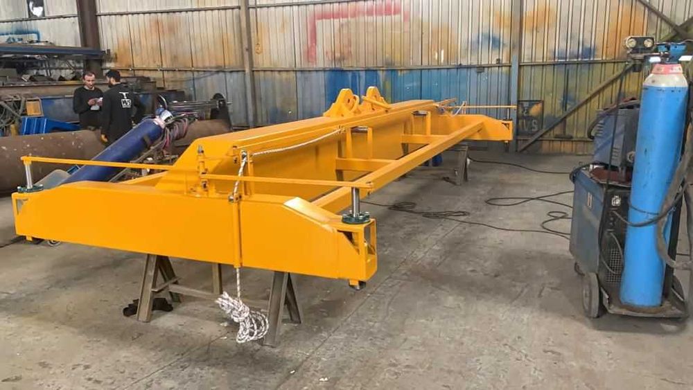 Устройство  для  подъёма  контейнеров