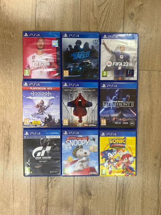 PlayStation 4 standard , 2 manete, 9 jocuri.