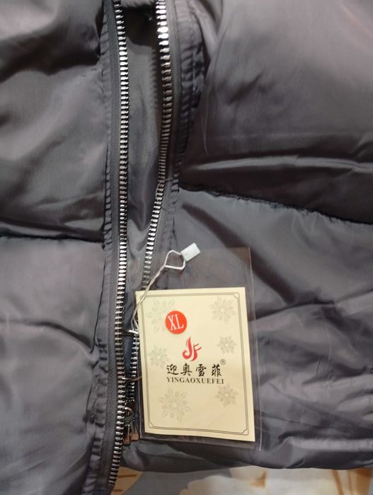 Женский пуховик .