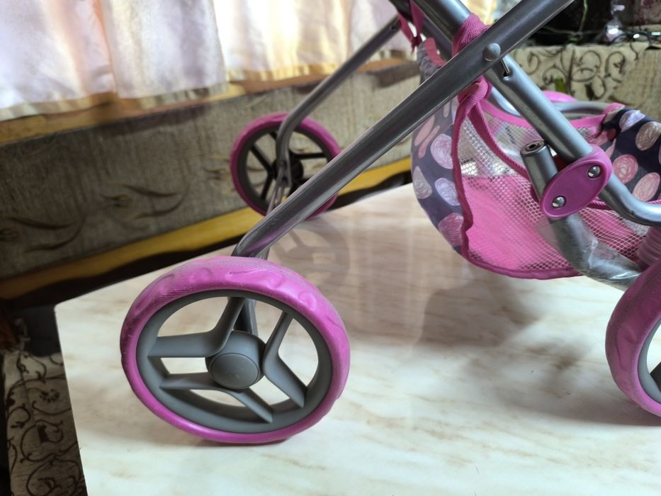 Игрушечная коляска