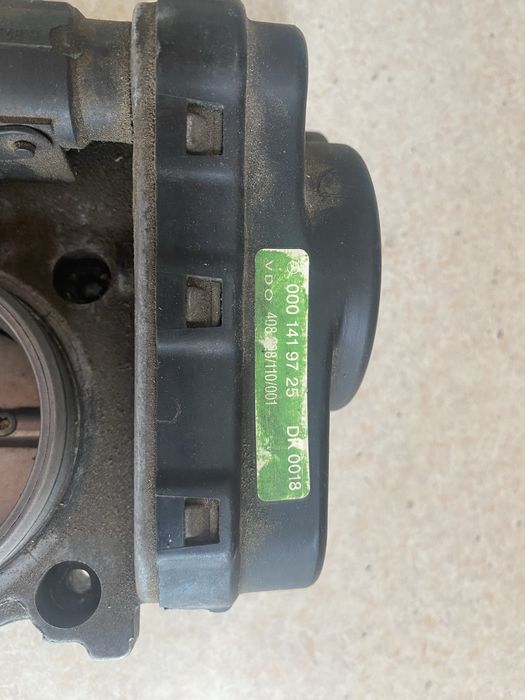 Дросельная заслонка