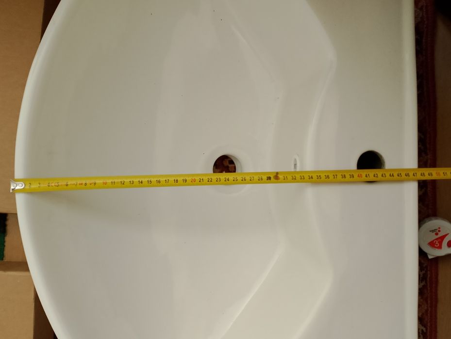 Бяла порцеланова мивка-намалявам