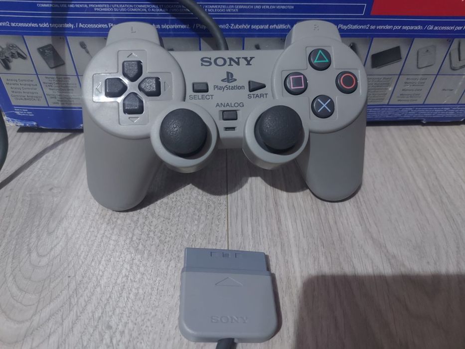 Controler original Playstation model SCPH-1200.