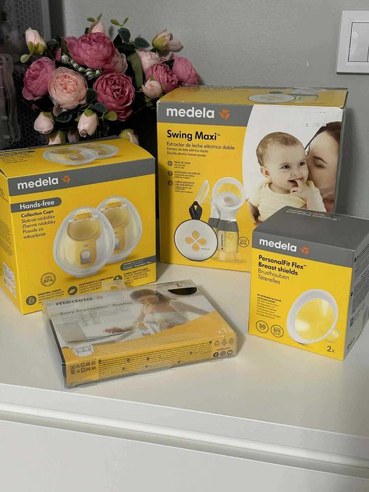 Комплект Medela помпа, чаши, фунии и бюстие