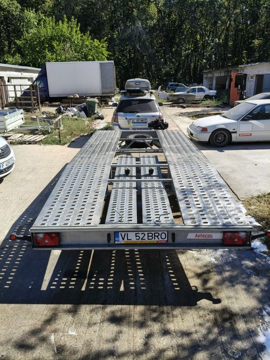 Remorca platforma auto 2026 NIEWIADOW Jupiter 4.5m MTMA 2000kg dreapta fata coborata spate CA NOUA