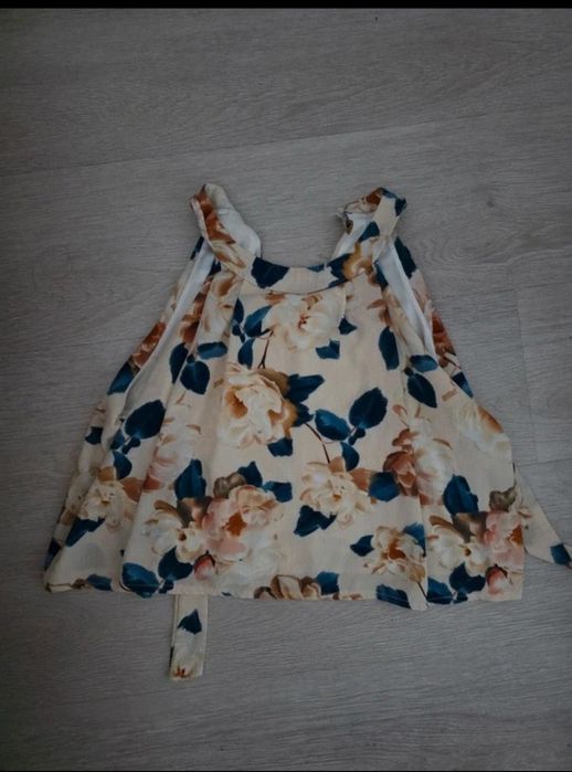 Top de vara oferta in descriere