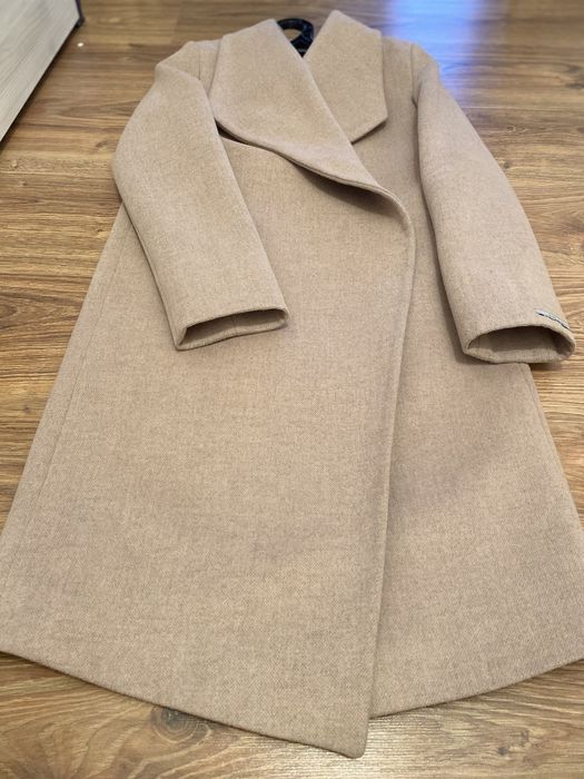 Продам пальто новое