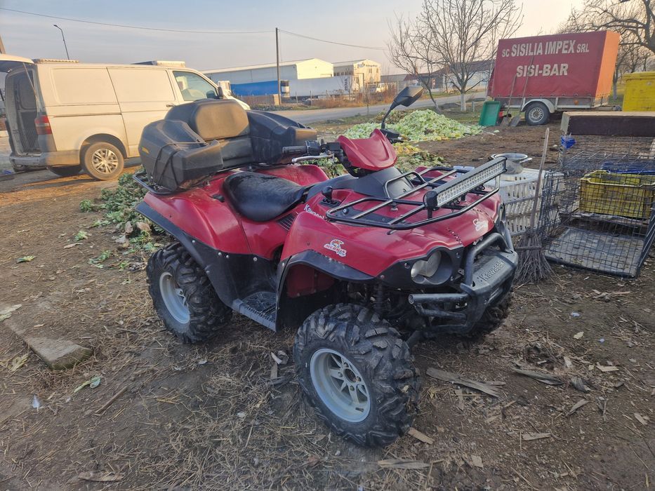Vând sau schimb ATV Kawasaki