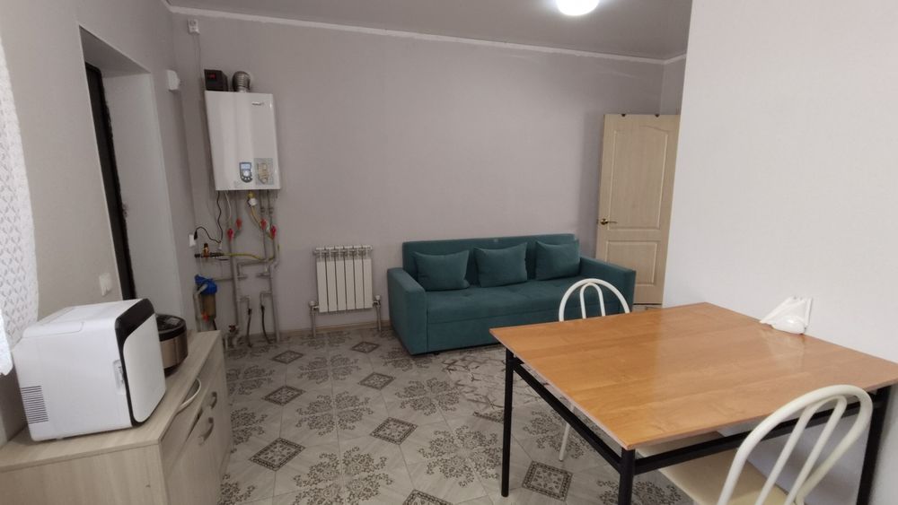 Квартиру с участком 2 сотки