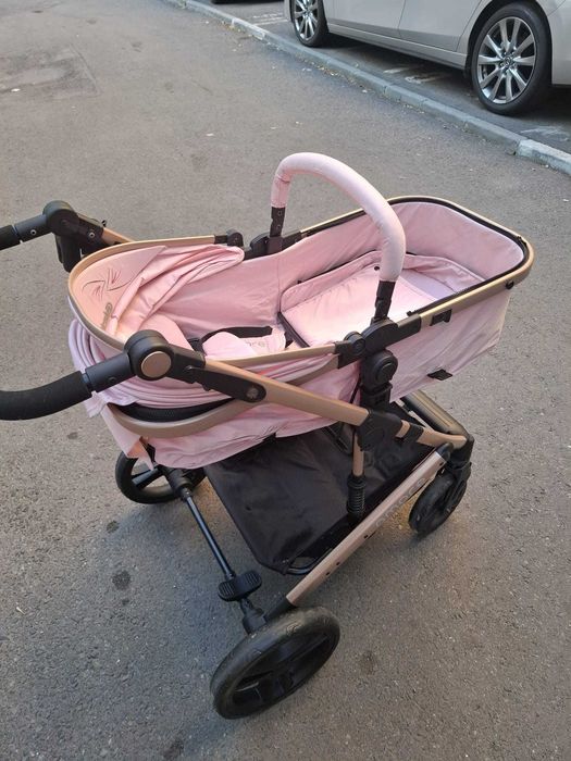 Cărucior roz cu landou si scoica